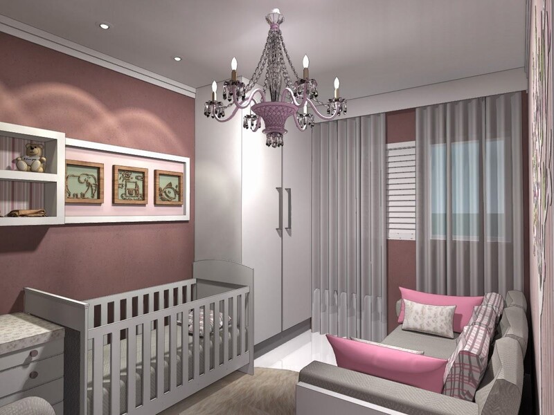 Quarto de bebê com berço e decoração em rosa